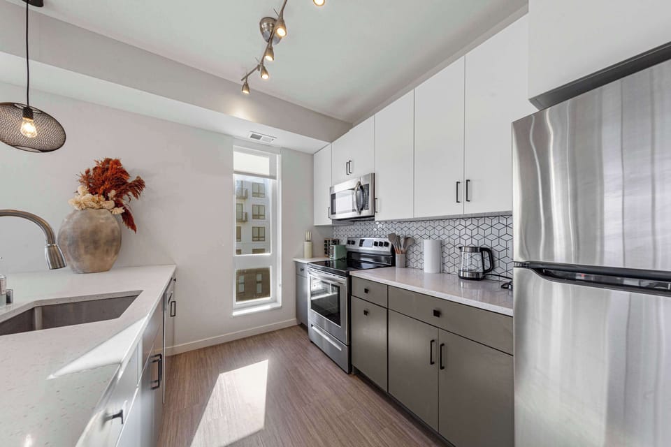 Cook with ease in a bright, modern kitchen that gives you everything needed for quick meals or full dinners during your stay.