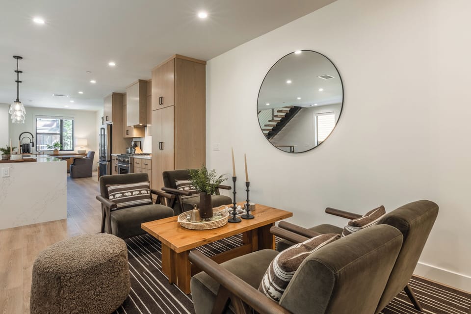 Living Room, Gas Fireplace,L Sectional Couch, Arm Chair, Private Deck, Game Seating area,65 smart flat screen tv