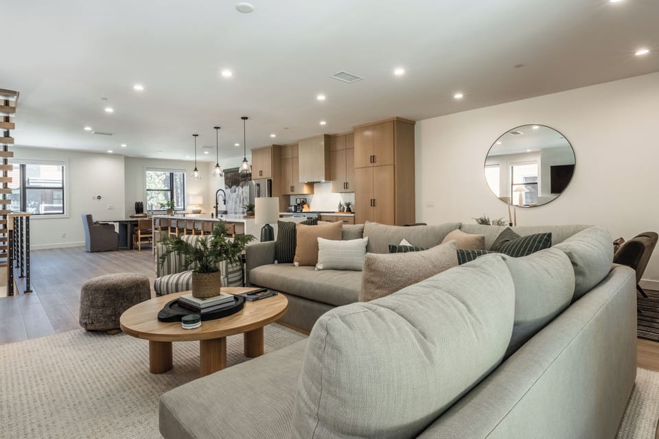 Living Room, Gas Fireplace,L Sectional Couch, Arm Chair, Private Deck, Game Seating area,65 smart flat screen tv