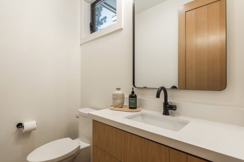 Half bath off living room/kitchen and dining room
