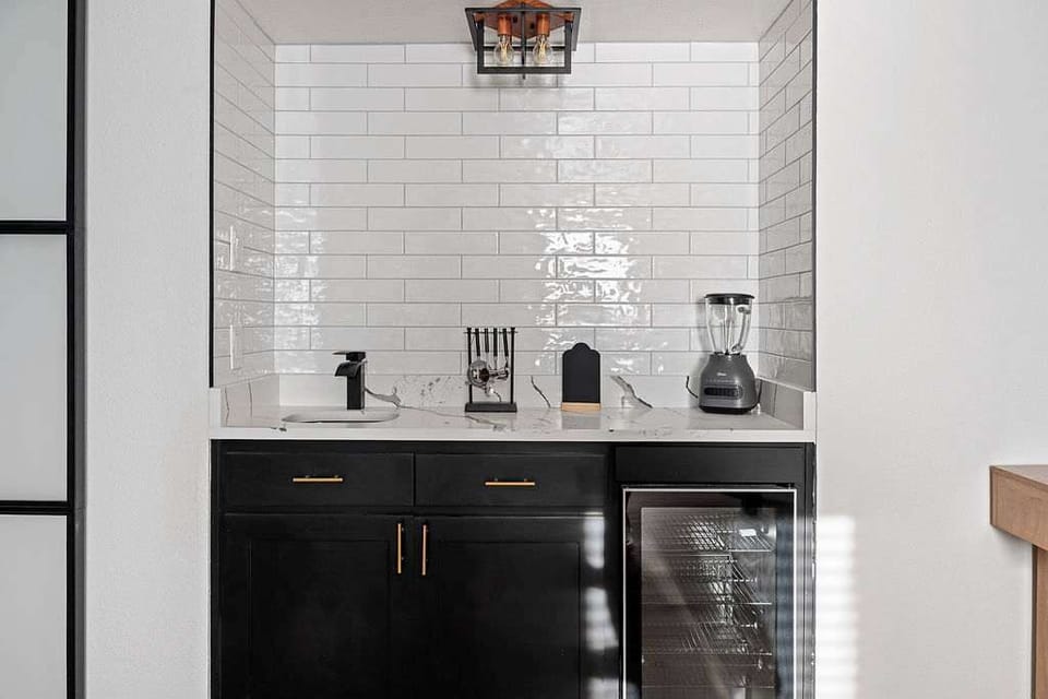 Stylish Coffee Bar Nook
Chic beverage station with espresso setup and storage.