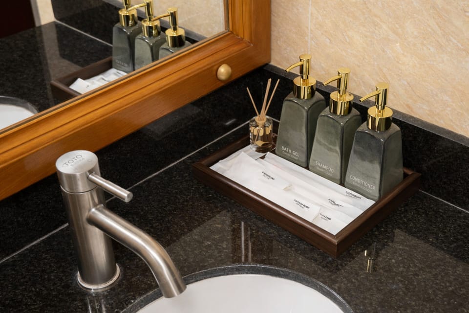 Family Triple Room, 2 Queen Beds, Air conditioning, Garden View | Bathroom | Shower, free toiletries, hair dryer, slippers