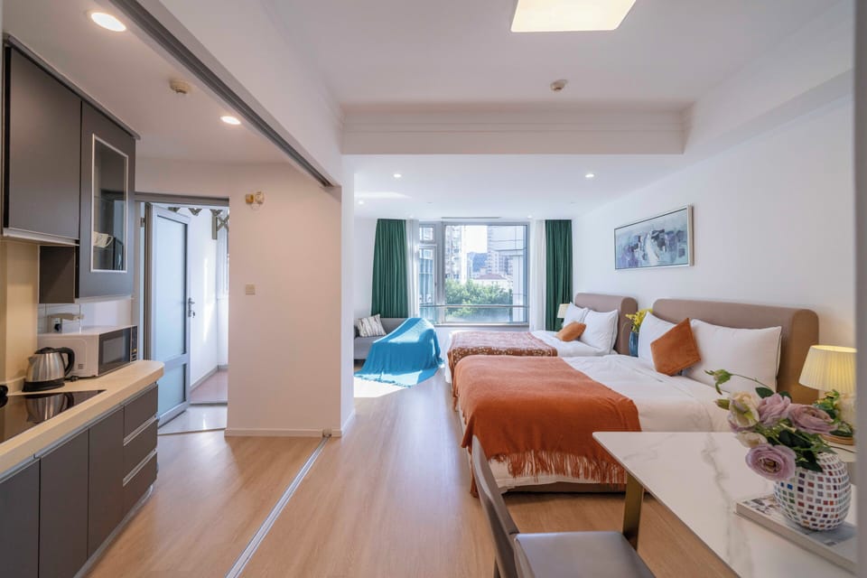 City View 2BR Serviced Residence - Comfortable Family Living | Premium bedding, down comforters, laptop workspace, blackout drapes