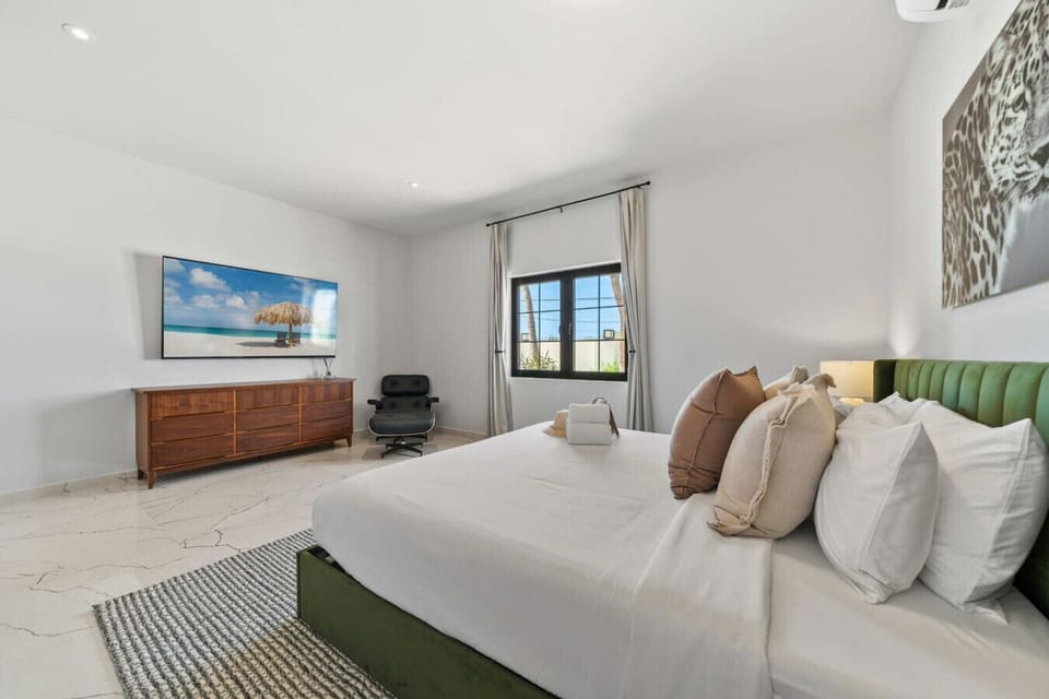 Spacious king suite with garden views for restful Aruba nights