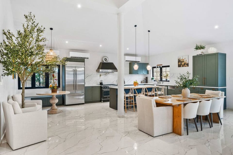 Spacious kitchen and dining area for family meals near Palm Beach