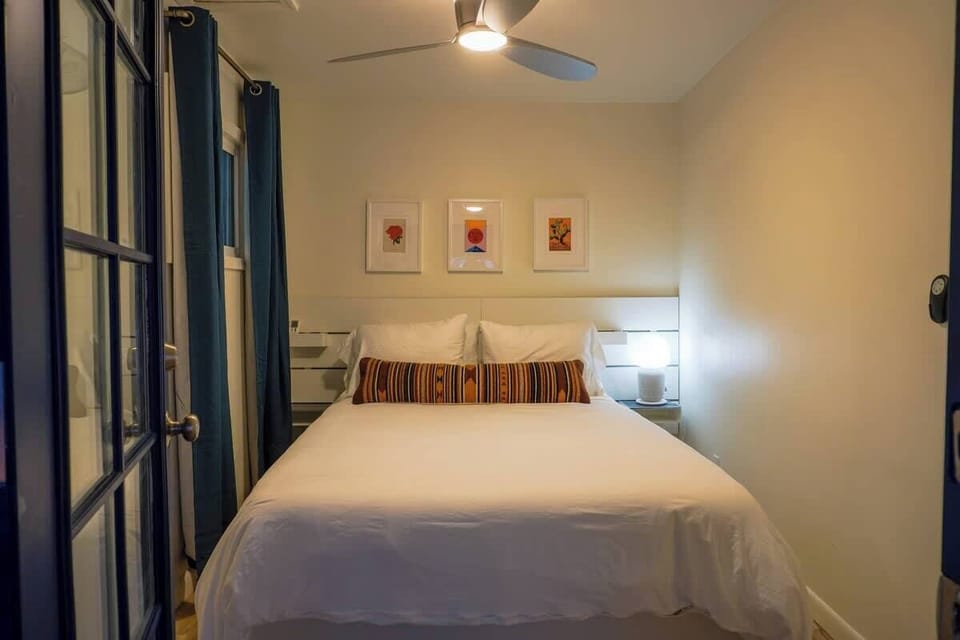 Peaceful bedroom with a comfortable bed and fresh hotel-quality linens for a restful night's sleep.