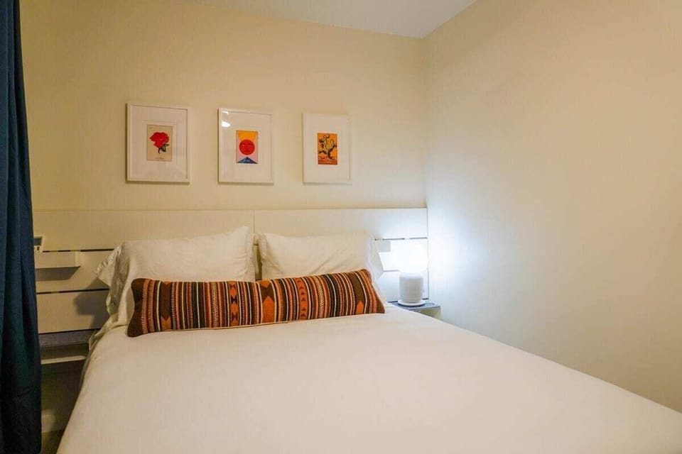 Peaceful bedroom with a comfortable bed and fresh hotel-quality linens for a restful night's sleep.