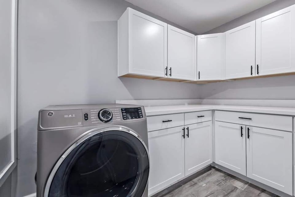 Convenient in-home laundry area with washer and dryer.