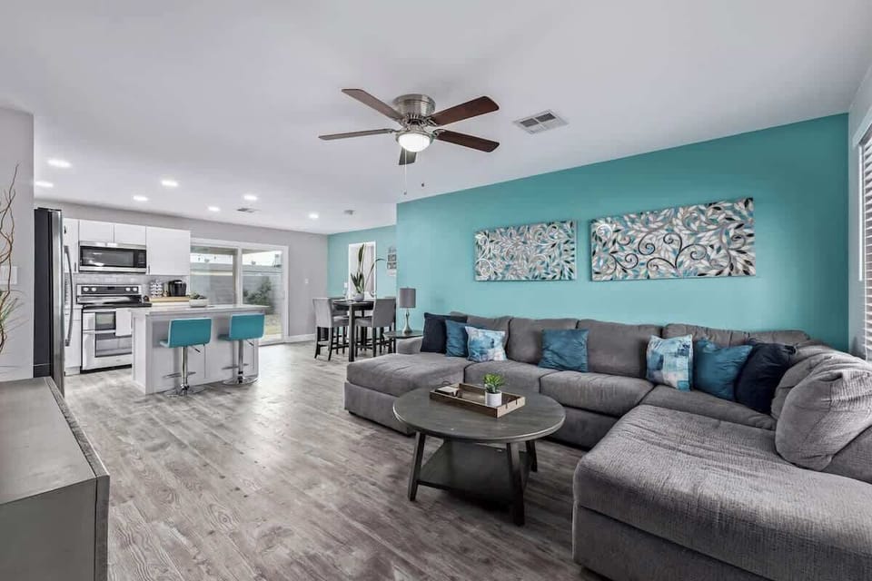 Bright and comfortable living space with plenty of seating to relax and unwind.