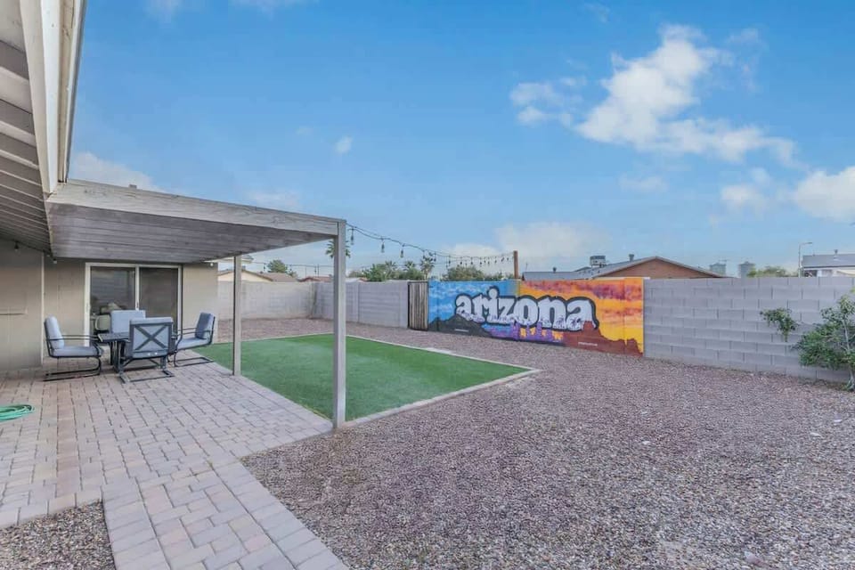 Spacious private backyard with outdoor seating.