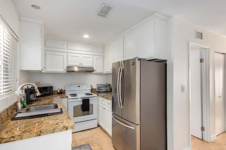 Cook up a storm in the fully equipped kitchen with all the appliances you need.
