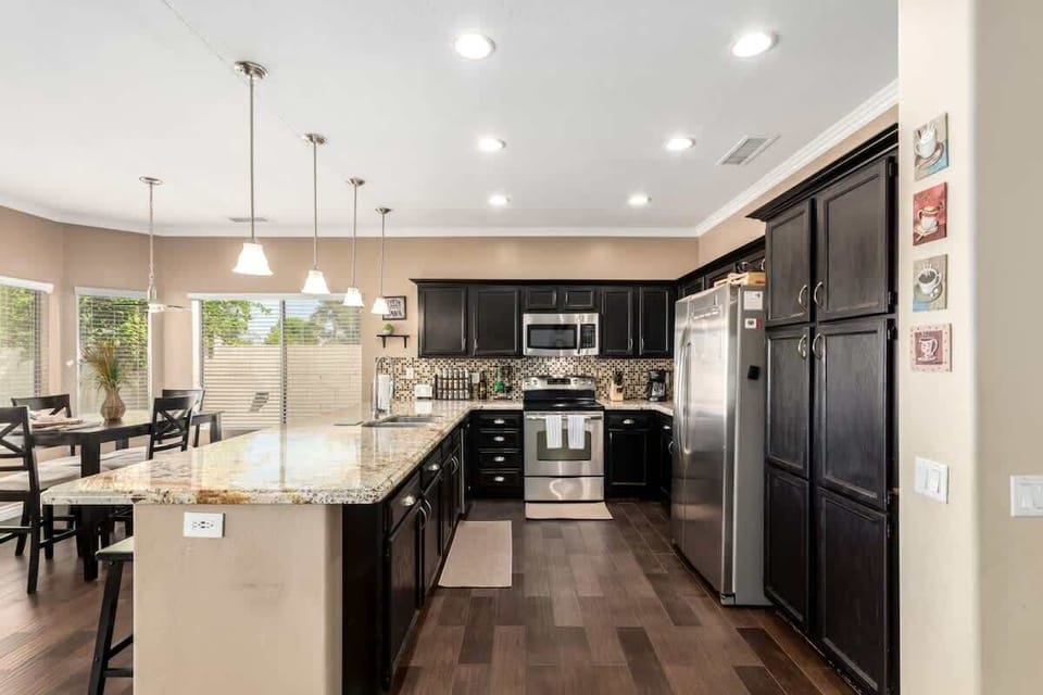 Fully equipped kitchen with modern appliances—everything you need for home-cooked meals.