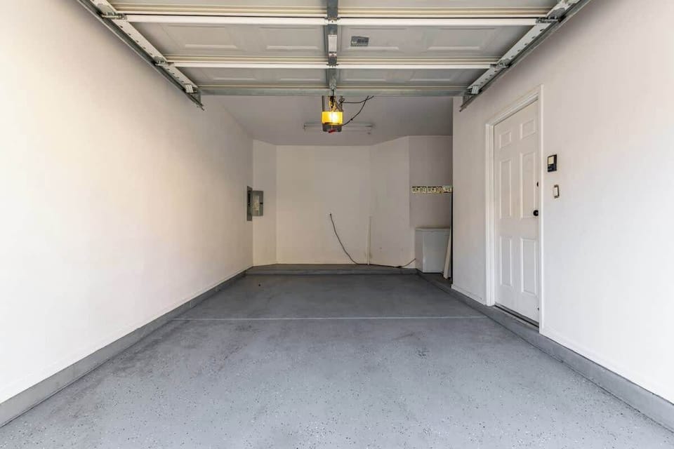 Private one-car garage plus additional visitor parking available.