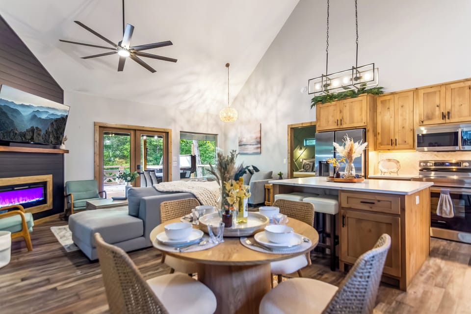 Open concept kitchen & dining area with modern appliances