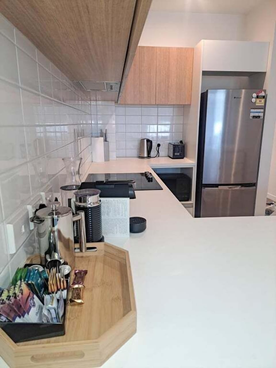 Arrive to a sleek, fully equipped kitchen designed for easy meals