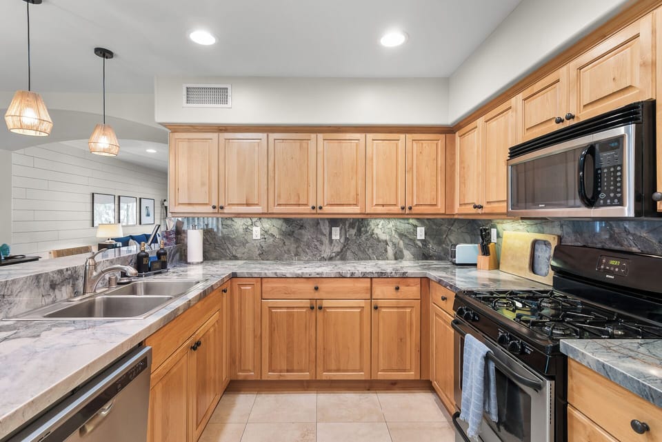 A fully equipped kitchen designed with both style and functionality in mind, offering everything you need to prepare meals with ease. Bright, spacious, and thoughtfully laid out for a seamless cooking experience.