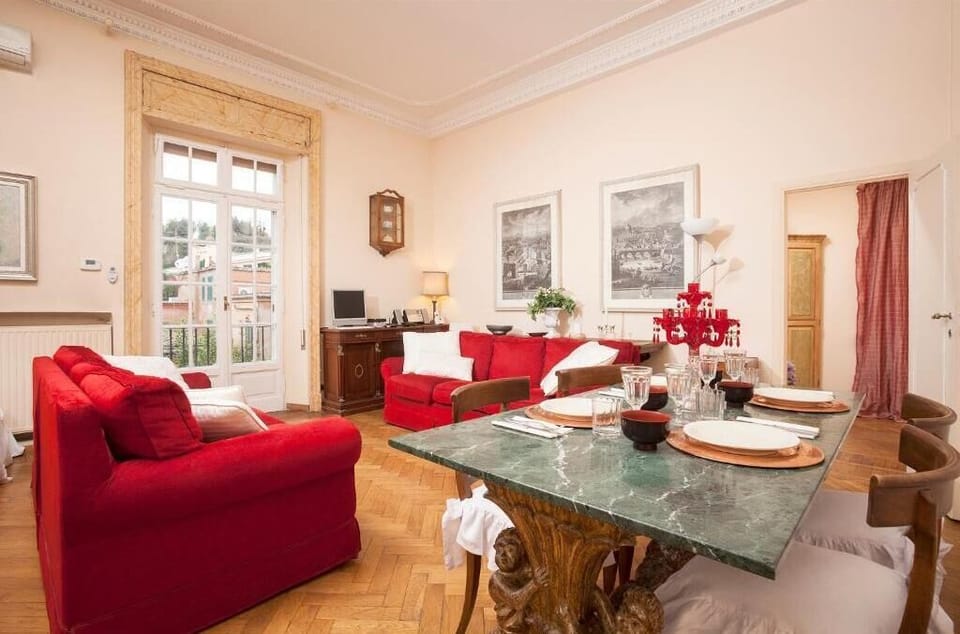 Deluxe Apartment, Balcony | Living area | 40-inch LED TV with cable channels