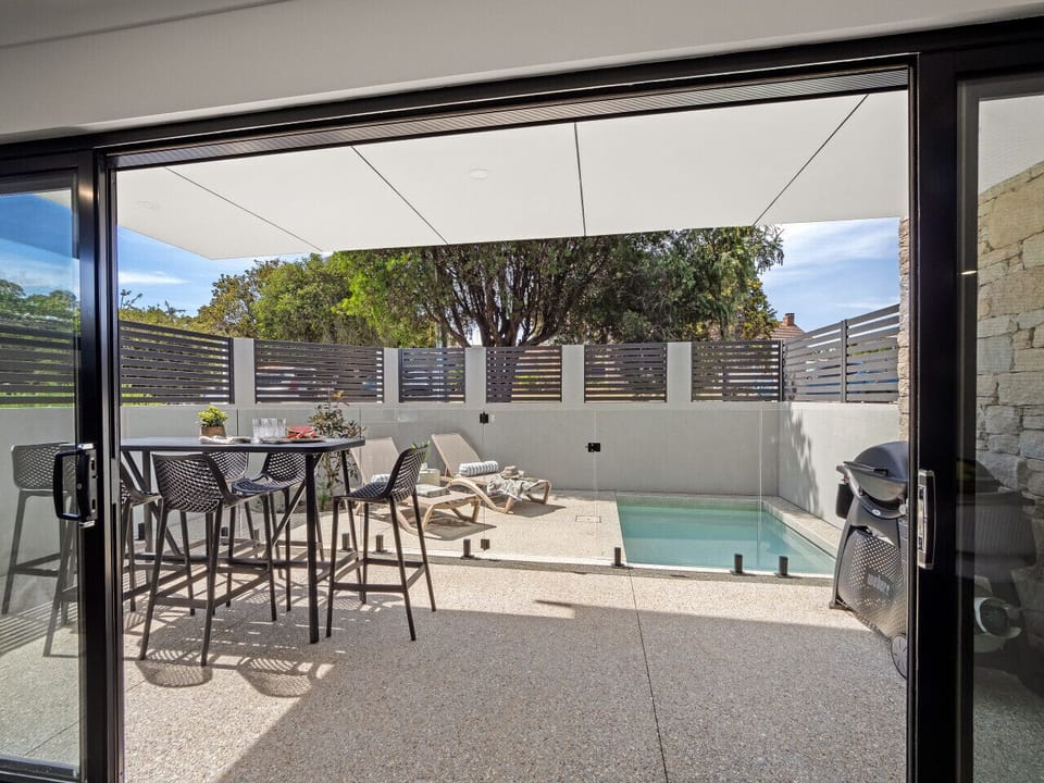 Outdoor Seating Area, Heated Pool, & BBQ Grill