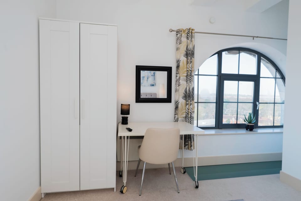 Storage and desk / dressing area, creating space for you to work or get ready for your day ahead.