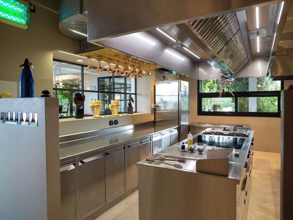 Kitchen, Interior Design, Countertop, Ceiling, Lighting, Light Fixture, Kitchen Appliance, Flooring, Furniture, Major Appliance