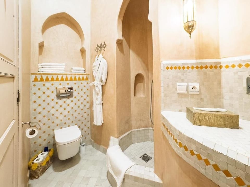 Shower, hair dryer, bathrobes, towels