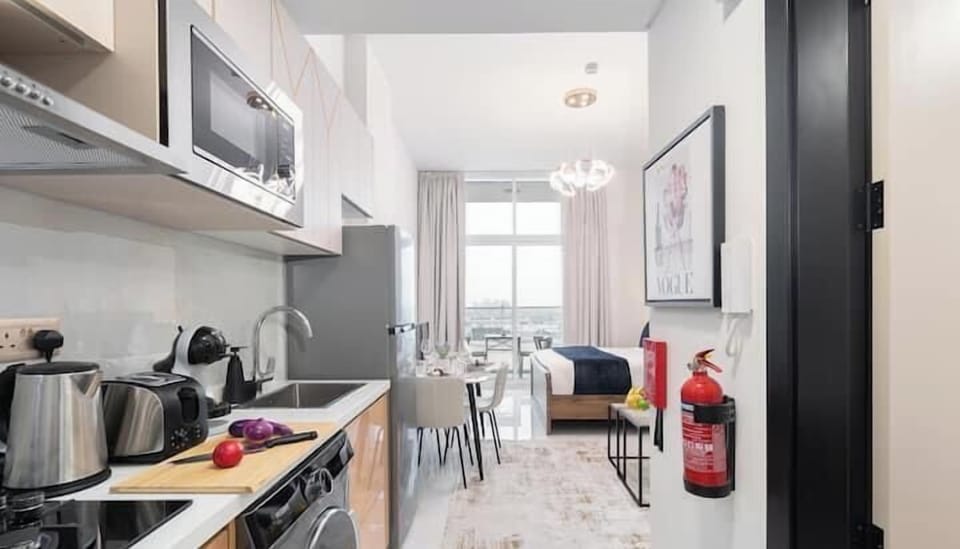 Luxury Studio, Balcony, City View | Private kitchen | Full-size fridge, microwave, oven, stovetop