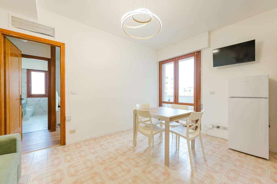 Apartment, Balcony, Courtyard View | Living area | Flat-screen TV