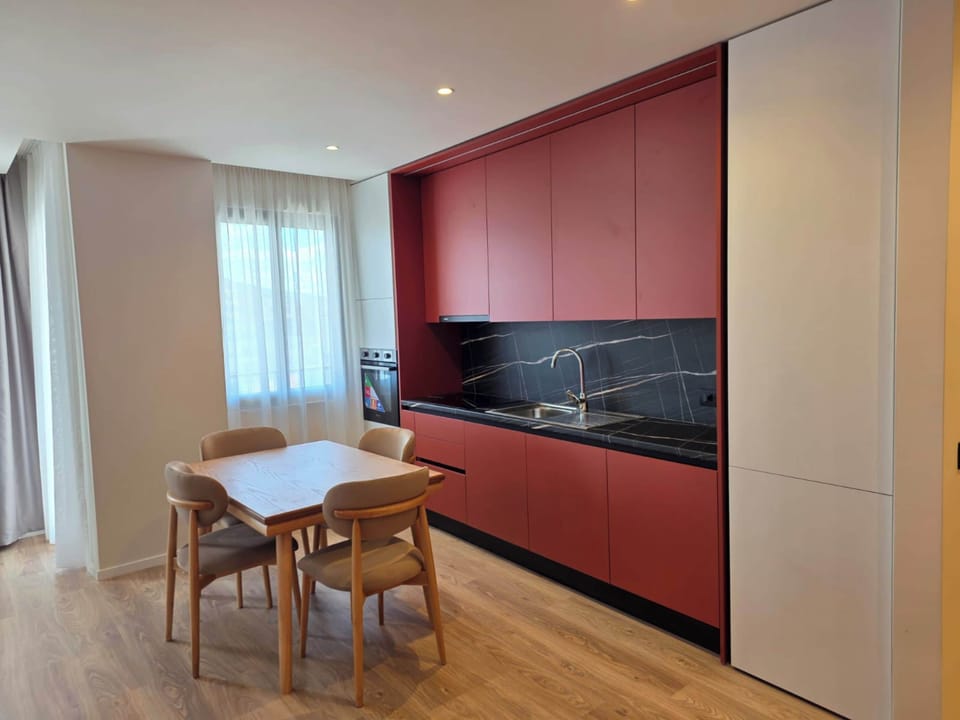 Deluxe Apartment, 2 Bedrooms | Living area | 42-cm flat-screen TV with satellite channels