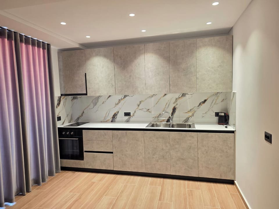 Apartment | Living area | 42-cm flat-screen TV with satellite channels