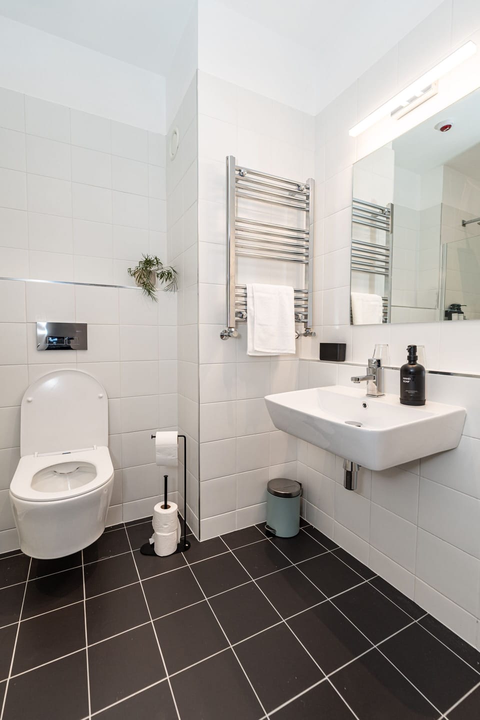 Shower, rainfall showerhead, hair dryer, towels