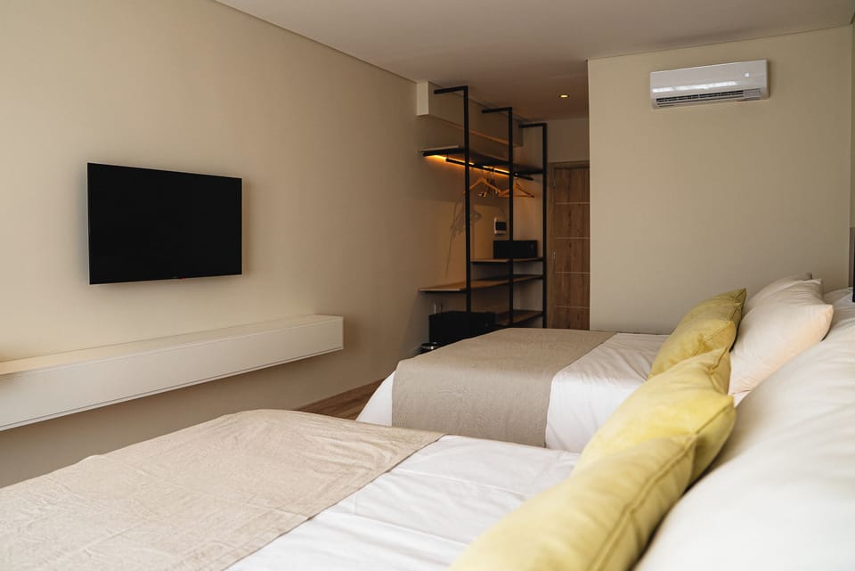 Superior Double Room, 2 Queen Beds | Minibar, in-room safe, desk, laptop workspace