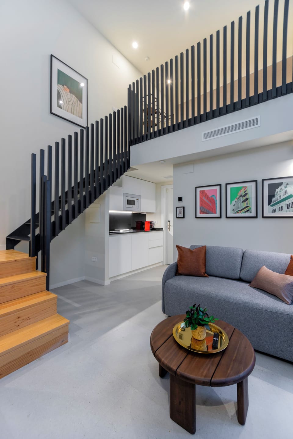 Deluxe Duplex | Living area | TV