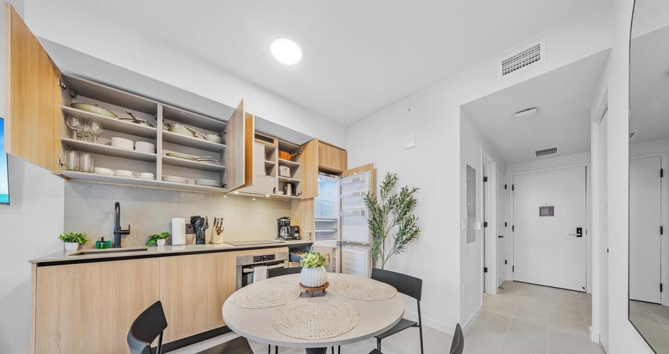 Condo, Balcony, City View | Private kitchen | Espresso maker, cookware/dishes/utensils, eco-friendly cleaning products