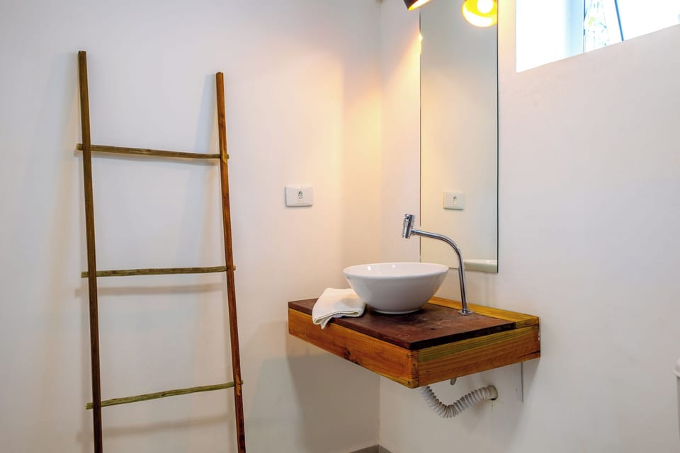 Triple Room | Bathroom | Shower, hair dryer, towels, soap