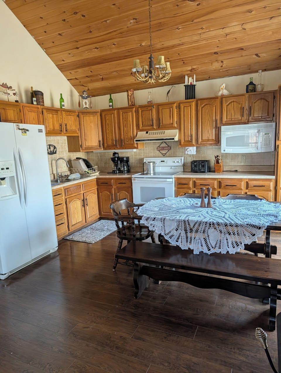 Kitchen and dining area with access to deck.