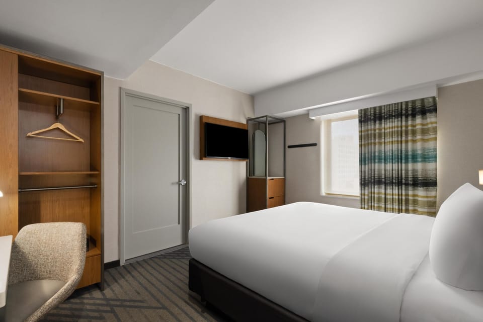 Room, 1 King Bed, Accessible (Roll-In Shower) | In-room safe, desk, free WiFi, bed sheets