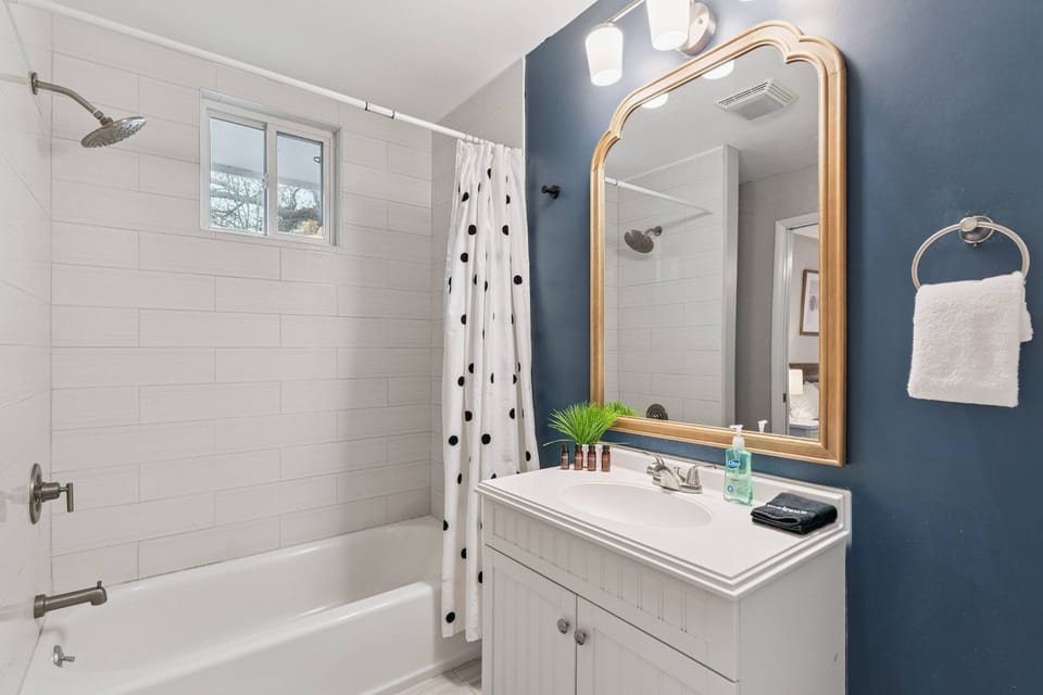 The primary bathroom is connected to the primary bedroom, but also has a separate door to the hallway.