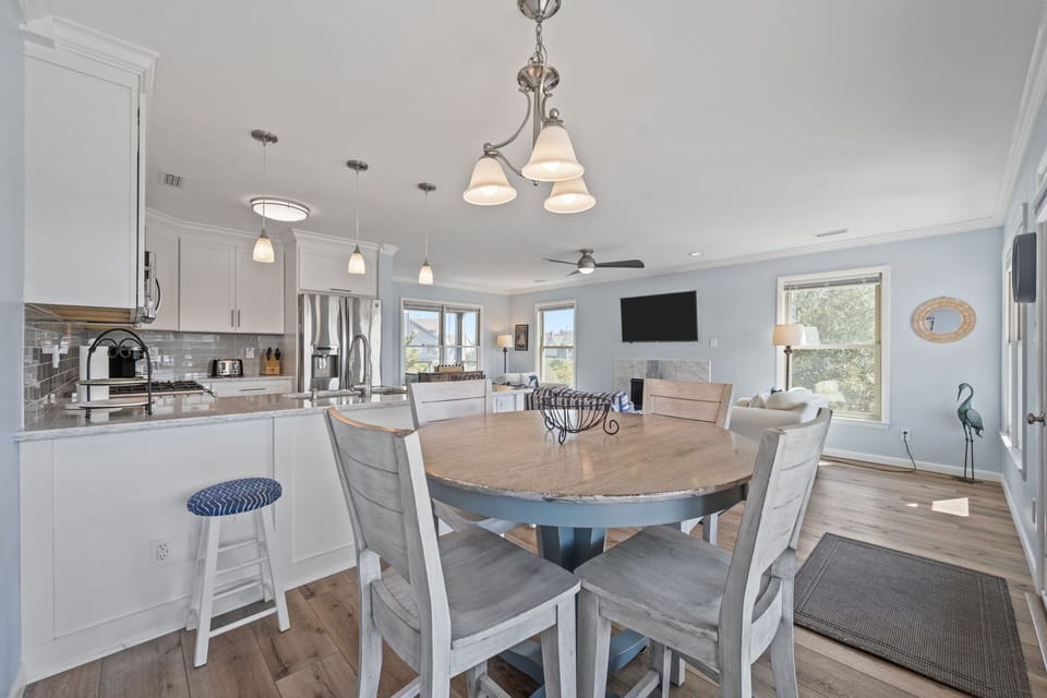 Enjoy easy flow between the kitchen, dining, and living areas.