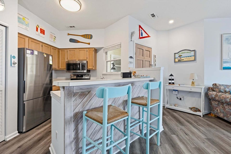 The fully equipped kitchen offers everything you need to prepare meals during your stay, with ample counter space and modern appliances.