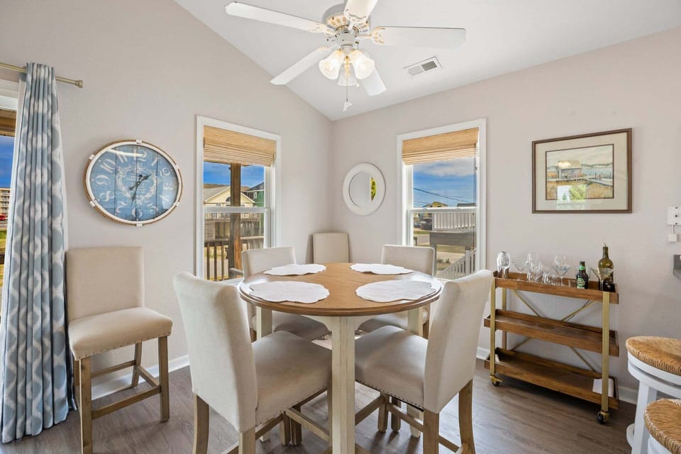 Enjoy meals together in a sunlit space just off the kitchen.