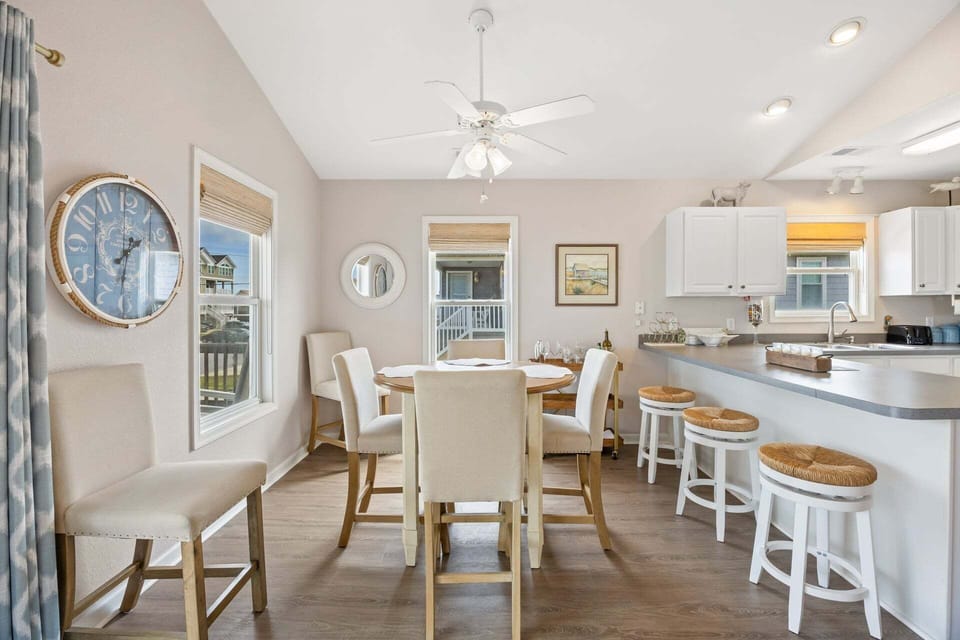 Enjoy meals together in a sunlit space just off the kitchen.