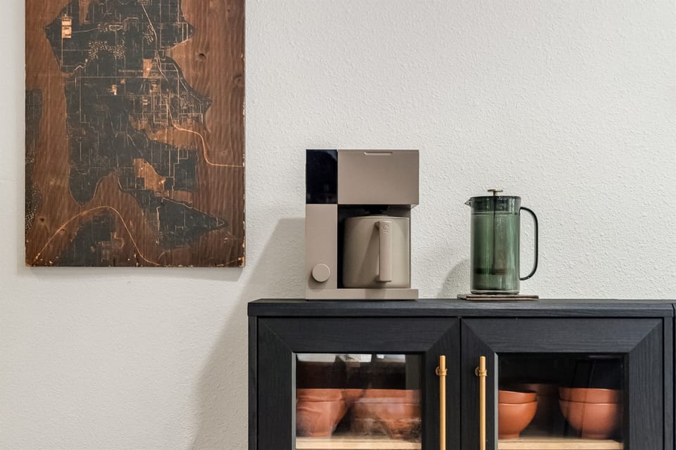 Designer touches like the rustic map of the island engraved in wood. Offer visual surprises throughout the house.