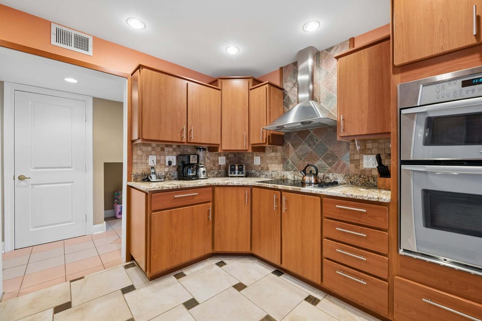 The kitchen is thoughtfully equipped to make meals easy, whether you're preparing a quick breakfast or hosting a family dinner.