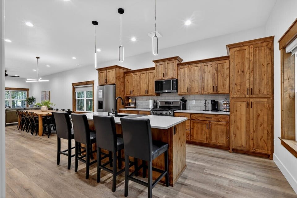 Kitchen (Main Floor) + Bar Seating (Seats 4)