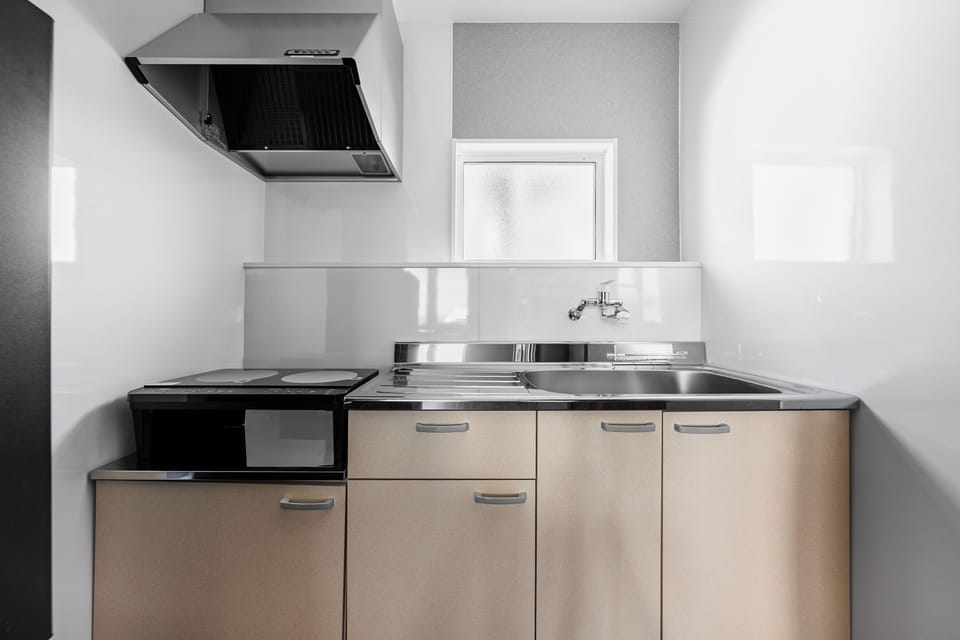 Apartment | Private kitchen | Fridge, microwave, stovetop, cookware/dishes/utensils