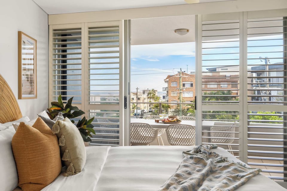 Master bedroom with king bed and ocean views