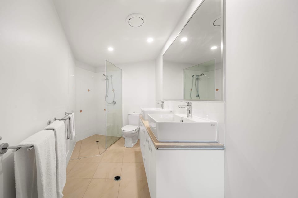 Stylish ensuite with double vanity and modern finishes