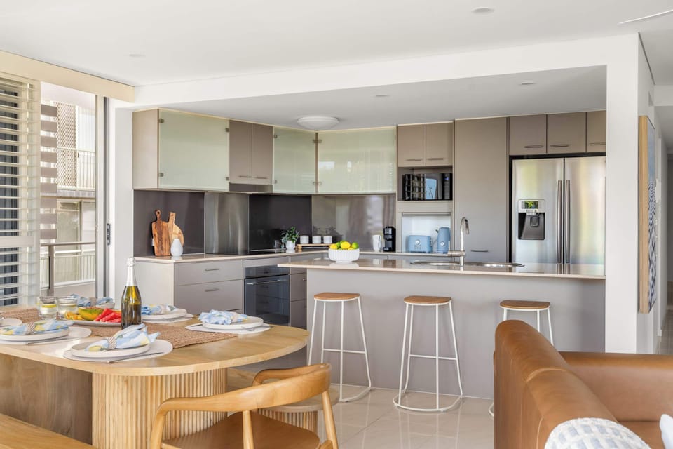 Open plan design connecting kitchen dining and living