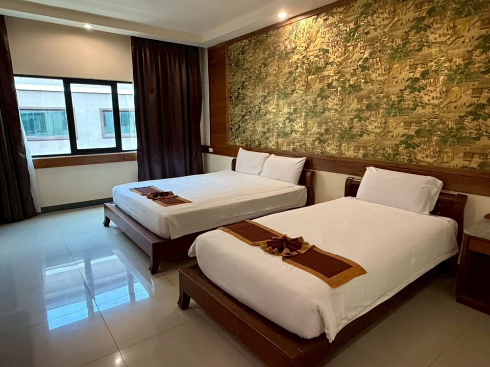 Deluxe Triple Room, Pool View | Desk, WiFi (free), bed sheets