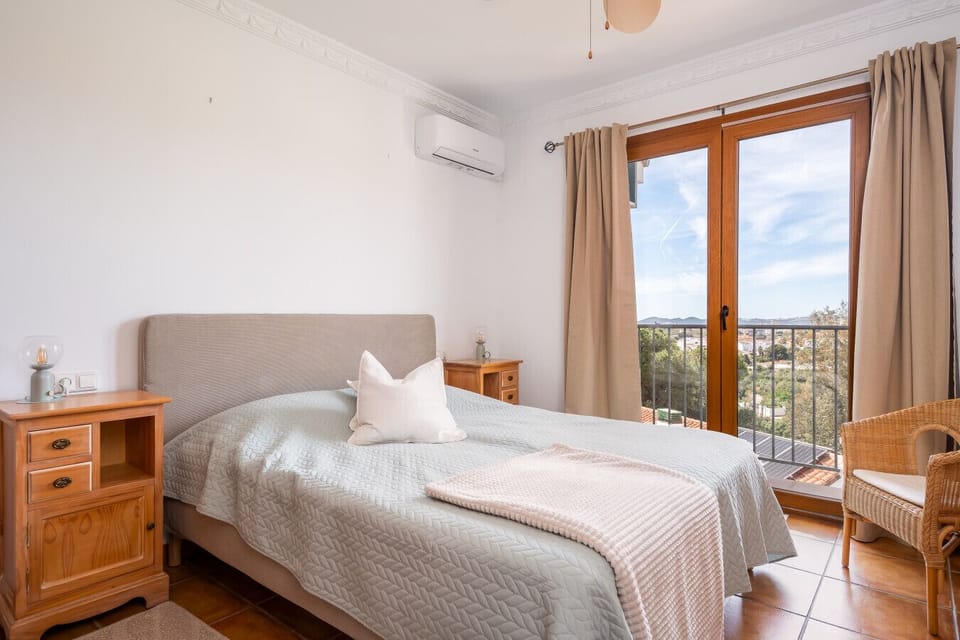 Rest comfortably in a premium double bed fitted with fresh linens, designed to ensure a peaceful night`s sleep. The bedroom features direct access to a private balcony, allowing you to wake up to fresh air and scenic views.
